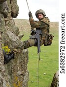 Military Art Print - Armed Military Alpinist Hanging On Rope