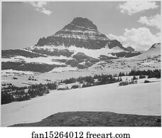 Looking across barren land to mountains, "From Logan Pass, Glacier National Park," Montana.  Photographs of National Parks and Monuments, compiled 1941 - 1942, documenting the period ca. 1933 - 1942.