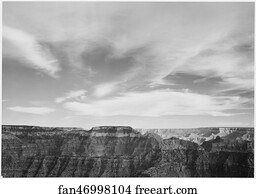Canyon edge, low horizon, clouded sky, "Grand Canyon National Park," Arizona.  Photographs of National Parks and Monuments, compiled 1941 - 1942, documenting the period ca. 1933 - 1942.