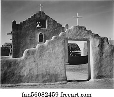 Full side view of entrance with gate to the right, "Church, Taos Pueblo National Historic Landmark, New Mexico, 1941." [Mission de San Geronimo].  Photographs of National Parks and Monuments, compiled 1941 - 1942, documenting the period ca. 1933 - 1942.