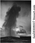 Taken at dusk or dawn from various angles during eruption. "Old Faithful Geyser, Yellowstone National Park," Wyoming. (vertical orientation).  Photographs of National Parks and Monuments, compiled 1941 - 1942, documenting the period ca. 1933 - 1942.