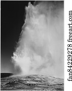 Taken at dusk or dawn from various angles during eruption. "Old Faithful Geyser, Yellowstone National Park," Wyoming. (vertical orientation).  Photographs of National Parks and Monuments, compiled 1941 - 1942, documenting the period ca. 1933 - 1942.