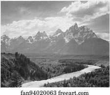 View from river valley towards snow covered mountains, river in foreground from left to right, "Grand Teton" National Park, Wyoming.  Photographs of National Parks and Monuments, compiled 1941 - 1942, documenting the period ca. 1933 - 1942.