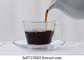 Free Art Print Of Pouring Coffee Into An Almost Full Cup Free Art Print Of Pouring Coffee Into An Almost Full Cup